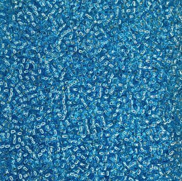 67000 Czech Preciosa beads 10 grams luminous pale blue