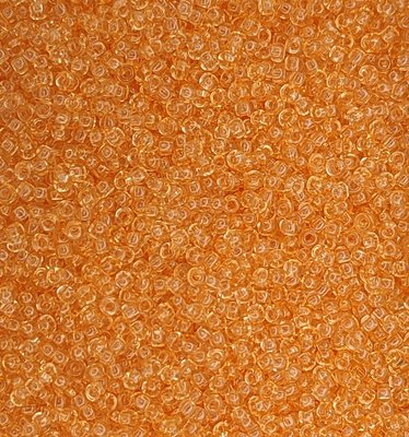 01284 чеський бісер Preciosa 10 грам прозорий світло-помаранчевий Б/50/0038 фото